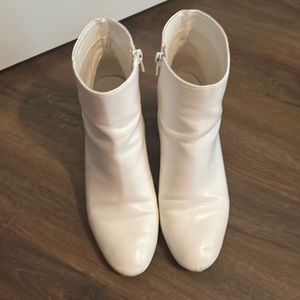 White ankle heeled booties